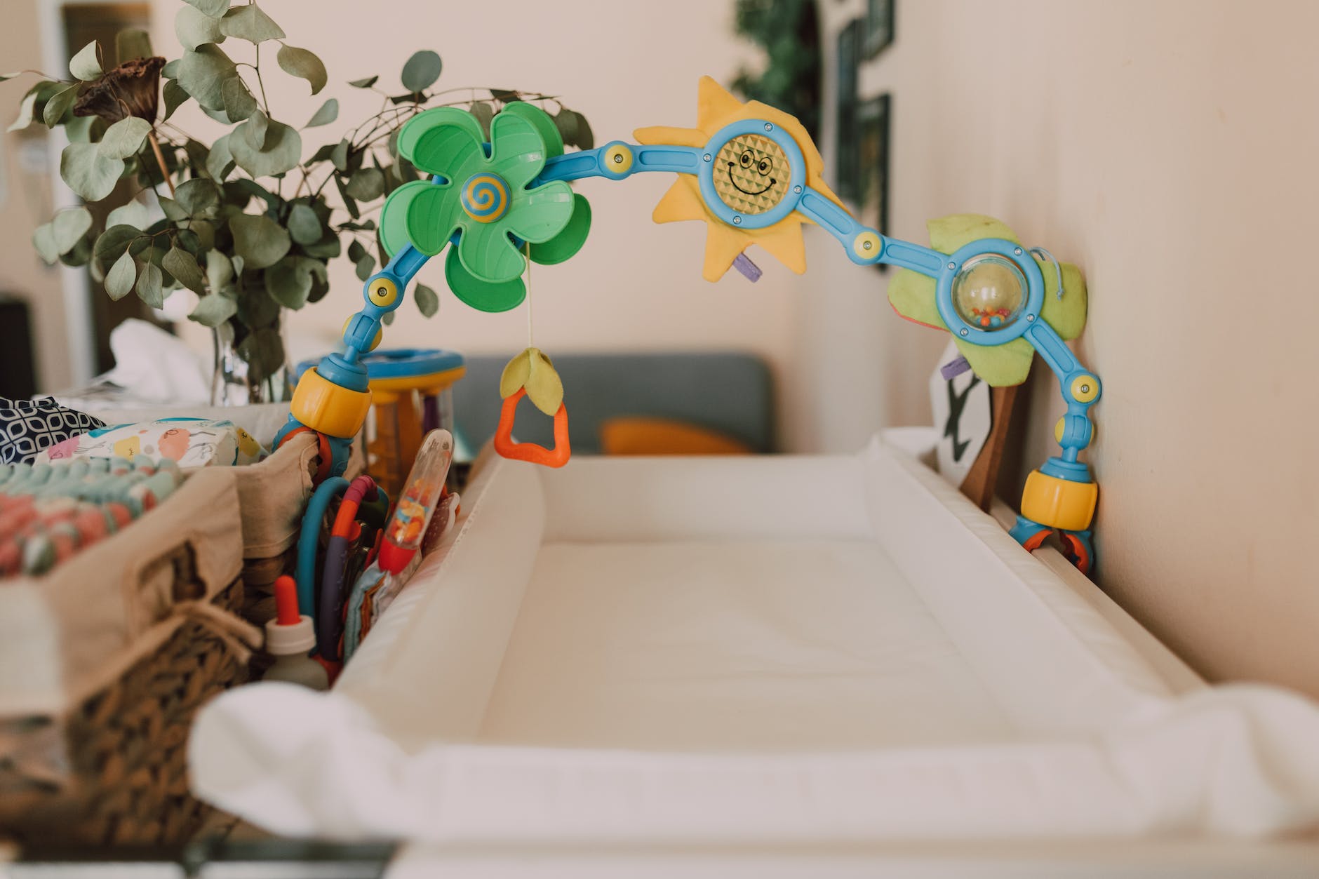 a baby bed with toys decoration
