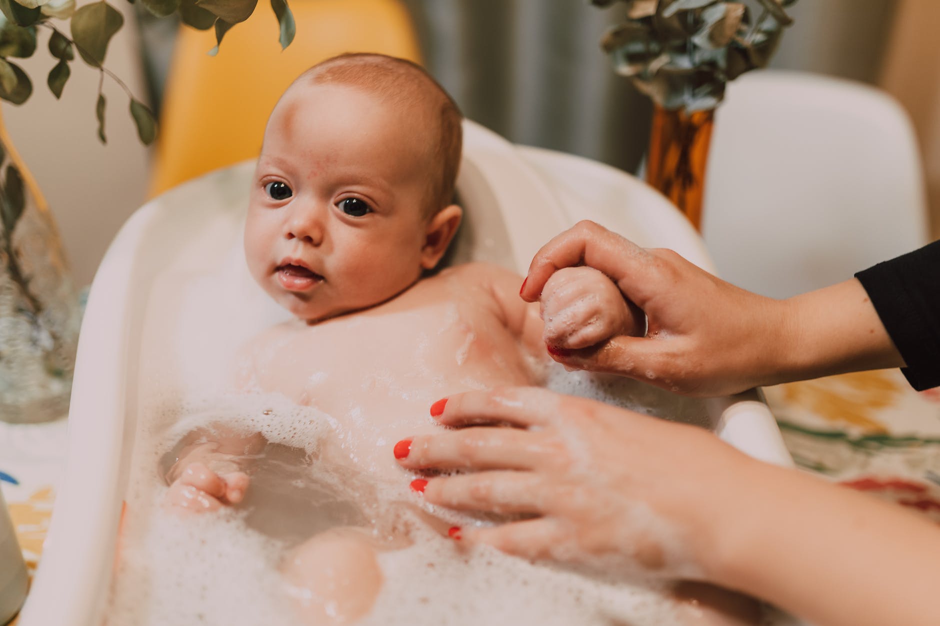 a baby getting a bath